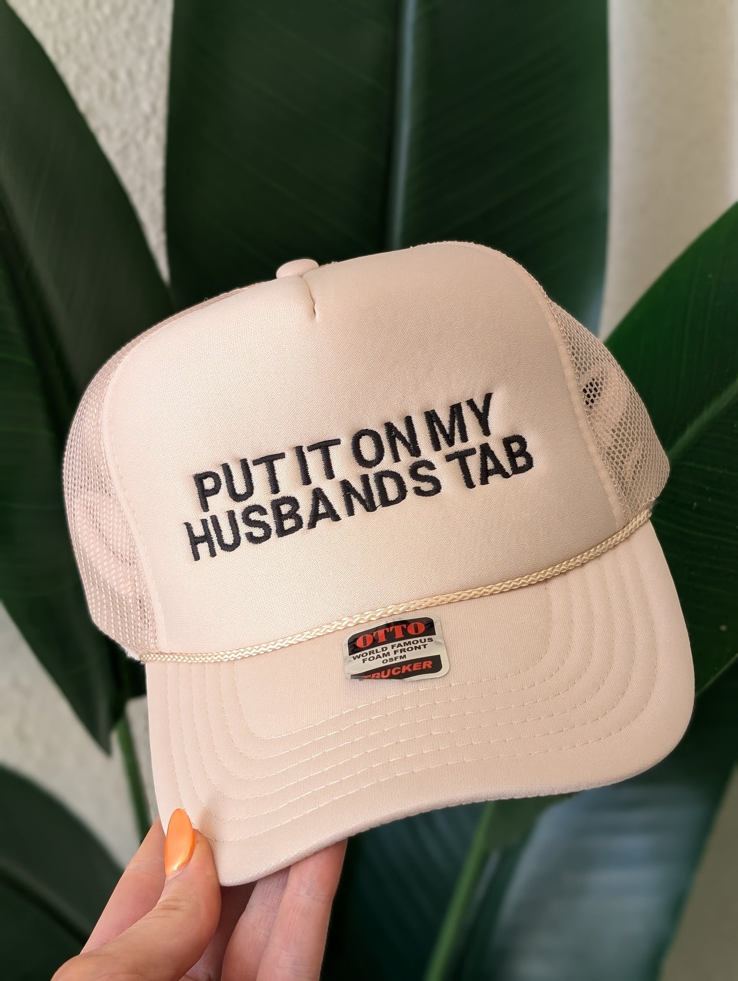 Put It On My Husband's Tab Trucker Hat
