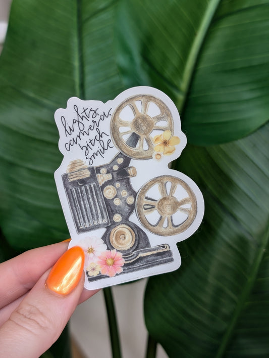 Lights, camera, bitch smile sticker